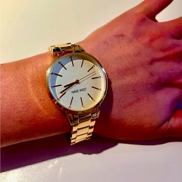 Nine West Women’s Crystal Accented Bracelet Watch